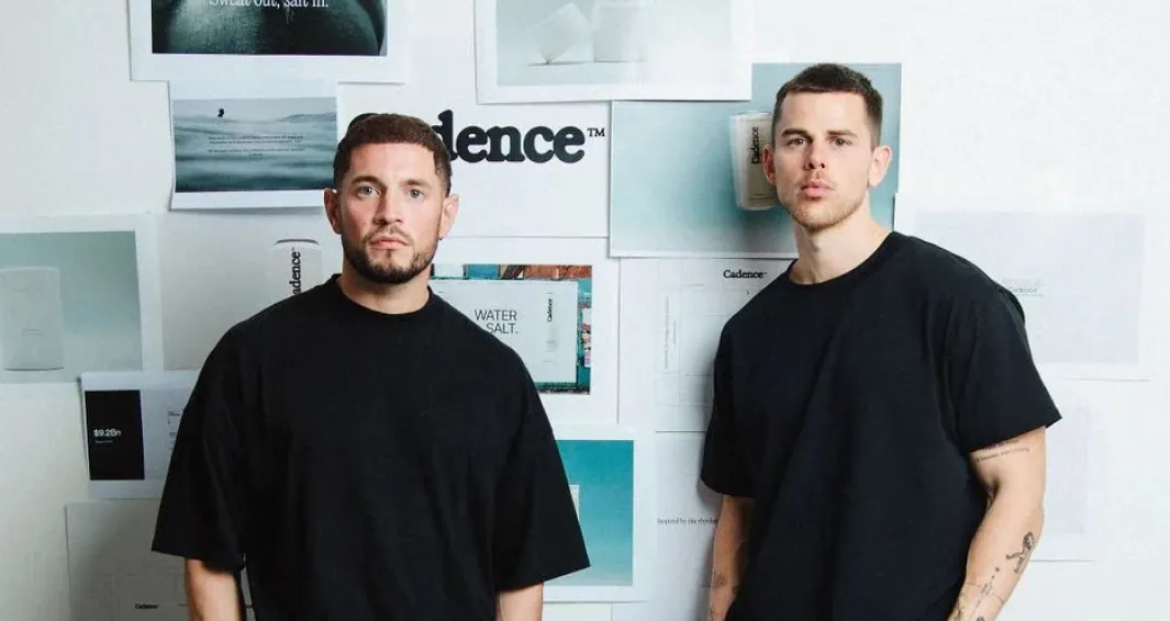Two men standing in a modern office studio