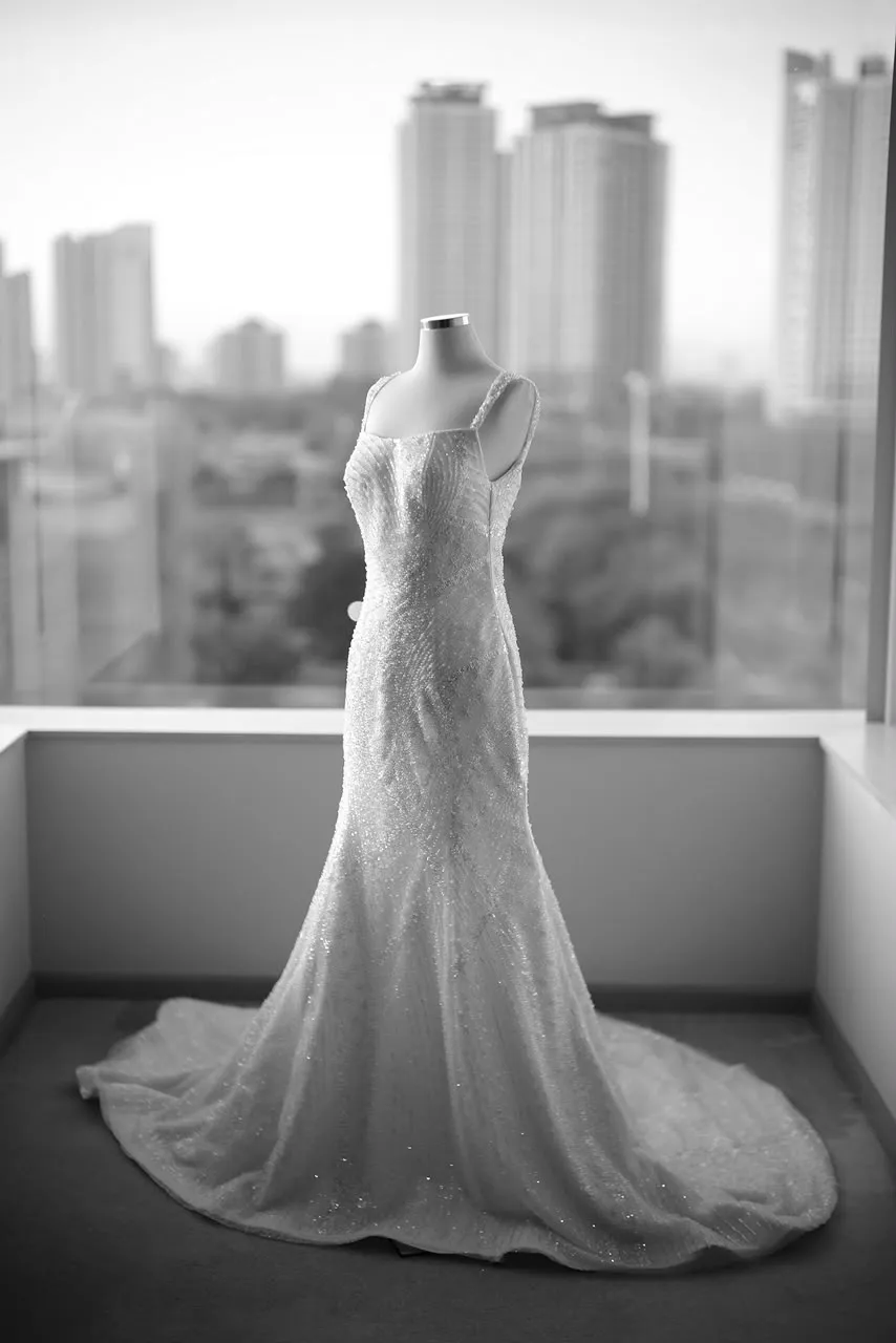 Close portrait of a bride in a beaded wedding gown
