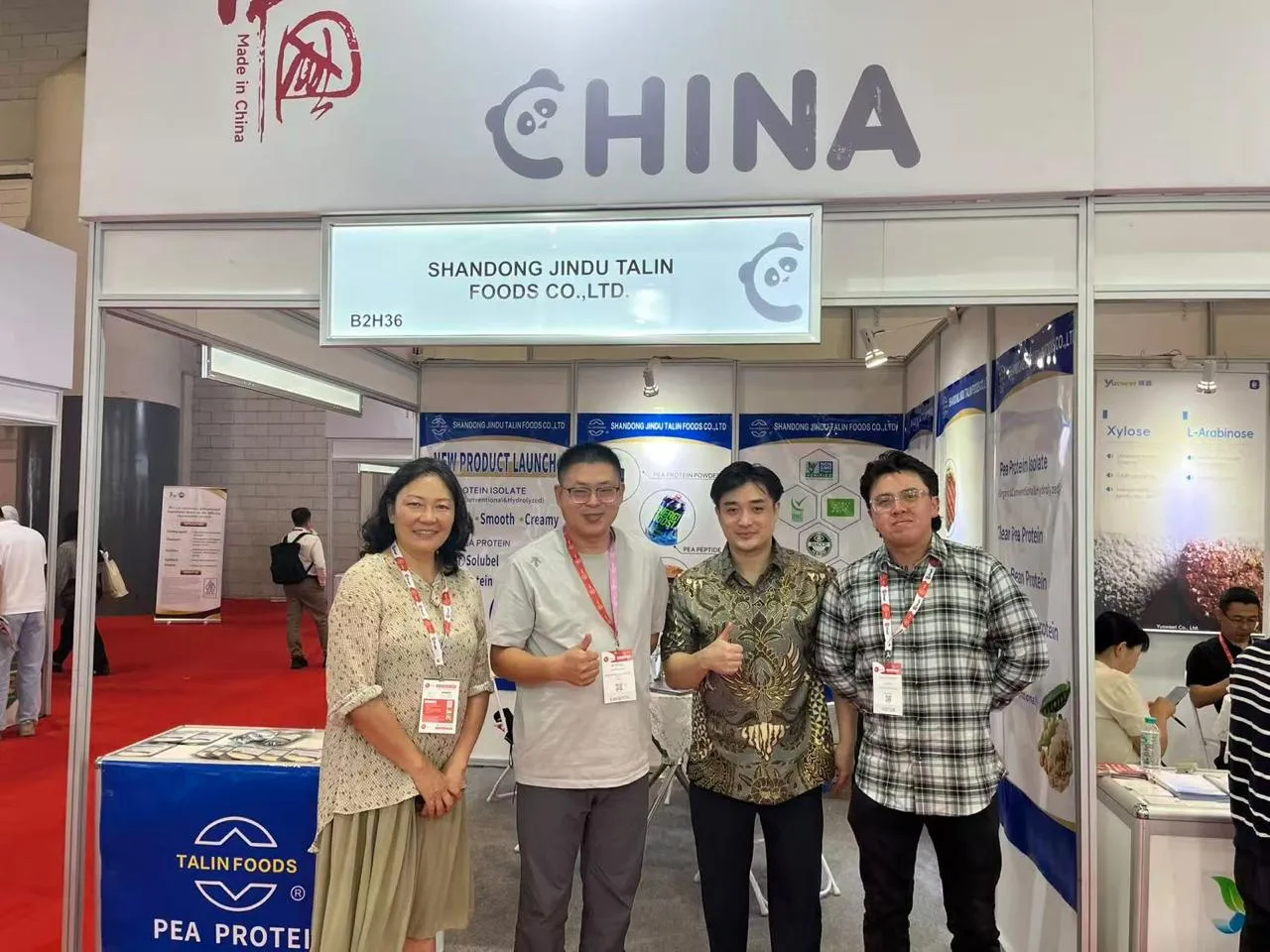 AKN representatives meeting partners at a trade show